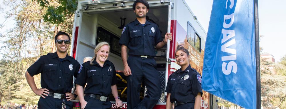 UC Davis Student EMTs stand beside EMS234