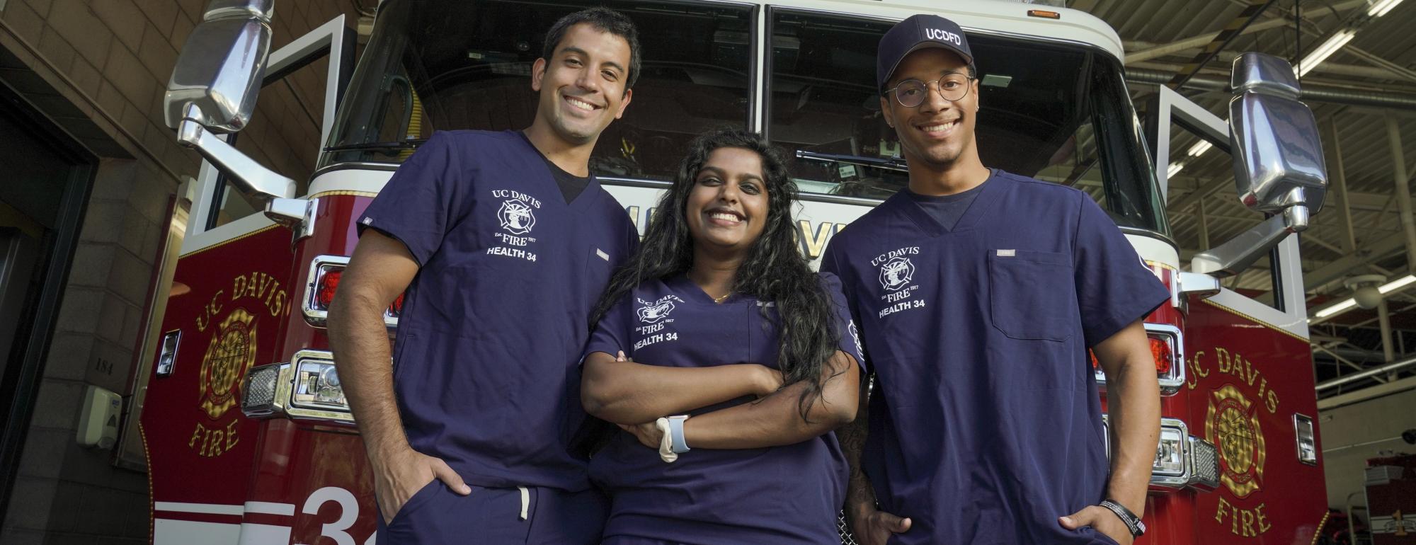 Members of Health 34 Standing in Front of Fire Truck.