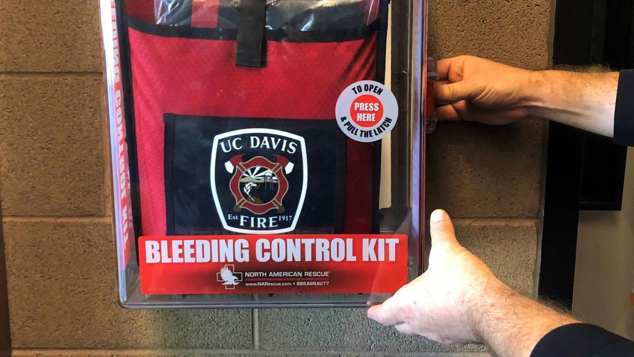 The first Stop the Bleed kit was installed in the UC Davis Fire Department lobby, with hopes to install them across campus. Red Stop the Bleed kit installed on the UC Davis Fire Department Wall.