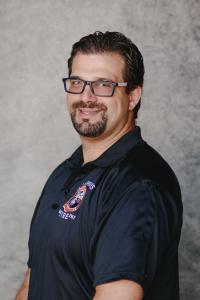 man in fire department polo tee