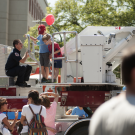 UC Davis Student Firefighter shows children around Truck 34 at Picnic Day 2016.