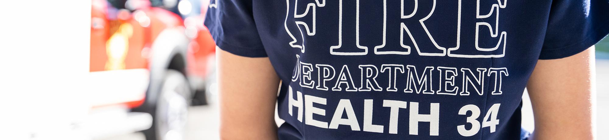 Health 34 logo on a t-shirt